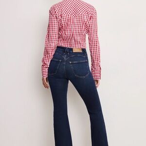 Good American Dolly Joleans Petite Flare Jeans